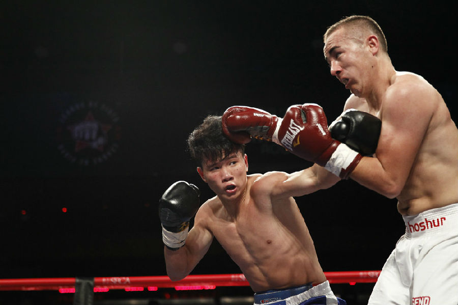 第七场 弹教才(蓝裤)VS阿力木·吾守尔(白裤).JPG