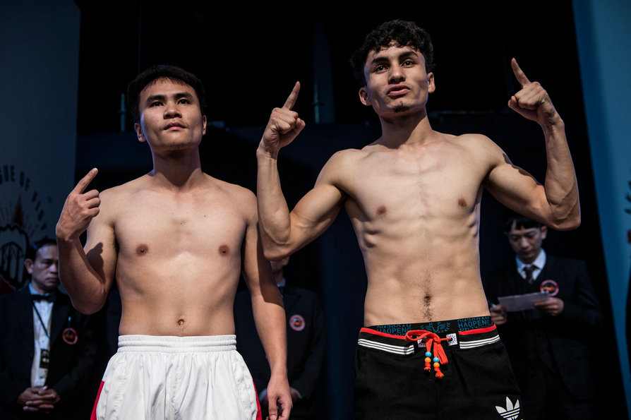 最轻量级 118磅 肖贤文(左)vs 买尔旦 斯依提(右).jpg