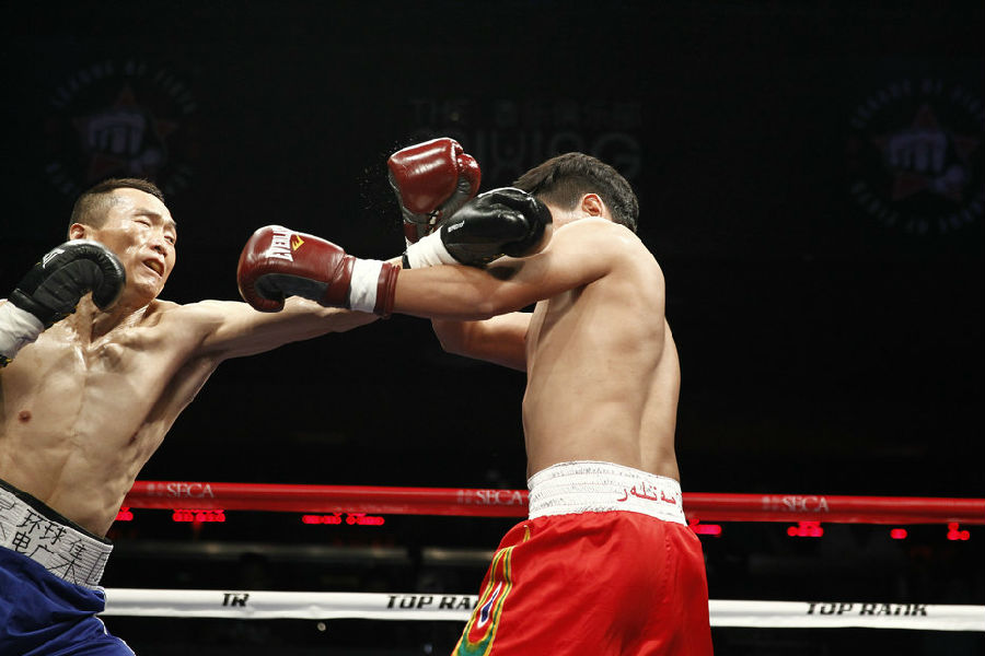 第四场 夏志林(蓝裤)VS亚库普·居麦(红裤).JPG