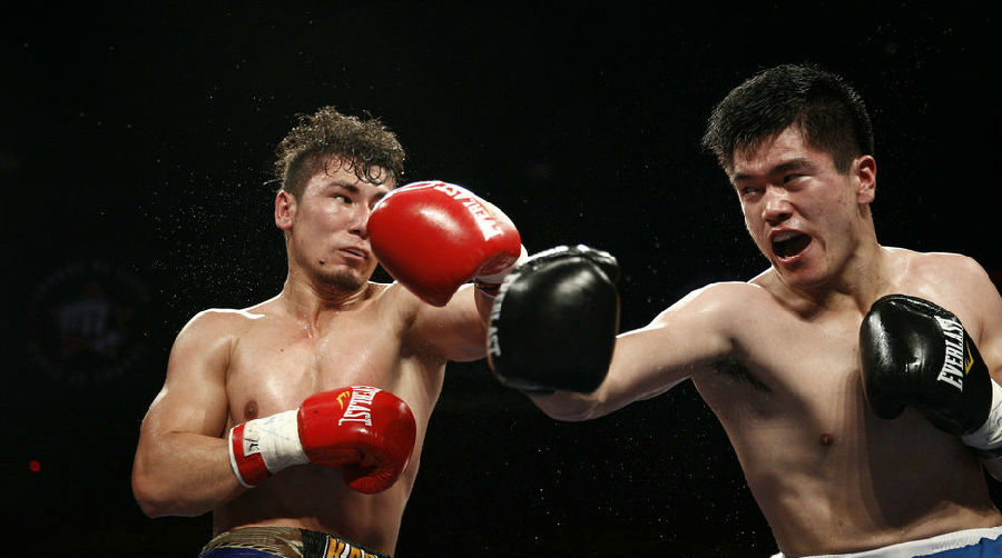 第七场 刘洋(蓝裤)VS祖力皮卡尔·买买提艾力(白裤).JPG